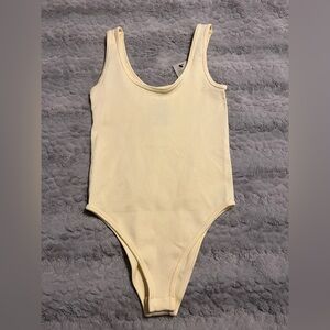 Women’s Yellow Bodysuit